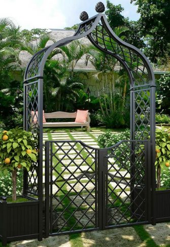 The Metal Garden Arch 'Brighton' with garden gate and versailles planters
