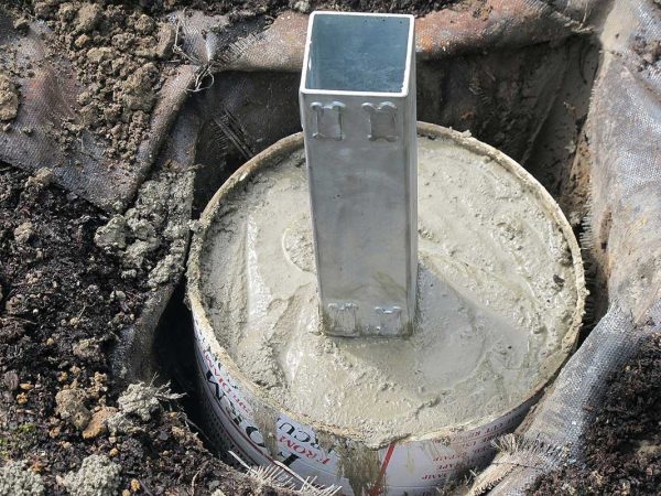 Part of the process of installing the Charleston Rose Obelisk by Classic Garden Elements