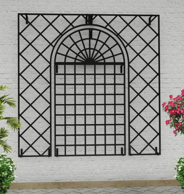The Treillage Metal Wall Trellis by Classic Garden Elements installed on a white wall