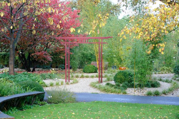 Torii Japanese Gate by Classic Garden Elements framing a garden path