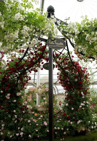The Lyme Park Wedding Gazebo by Classic Garden Elements covered with roses at the Chelsea Flower Show
