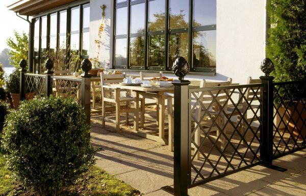 Restaurant Trellis Divider by Classic Garden Elements being used on a café terrace