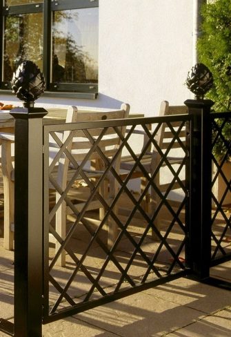 Restaurant Trellis Divider by Classic Garden Elements enclosing outside seating area