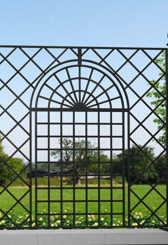 The Orangery Wrought-Iron Railing by Classic Garden Elements with pine-cone finials