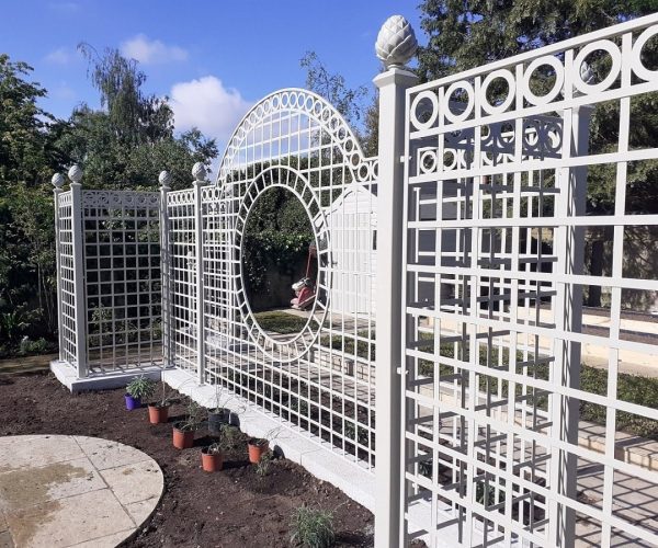 Side view of the exclusive Trianon Rose Treillage Set by Classic Garden Elements, powder coated in white