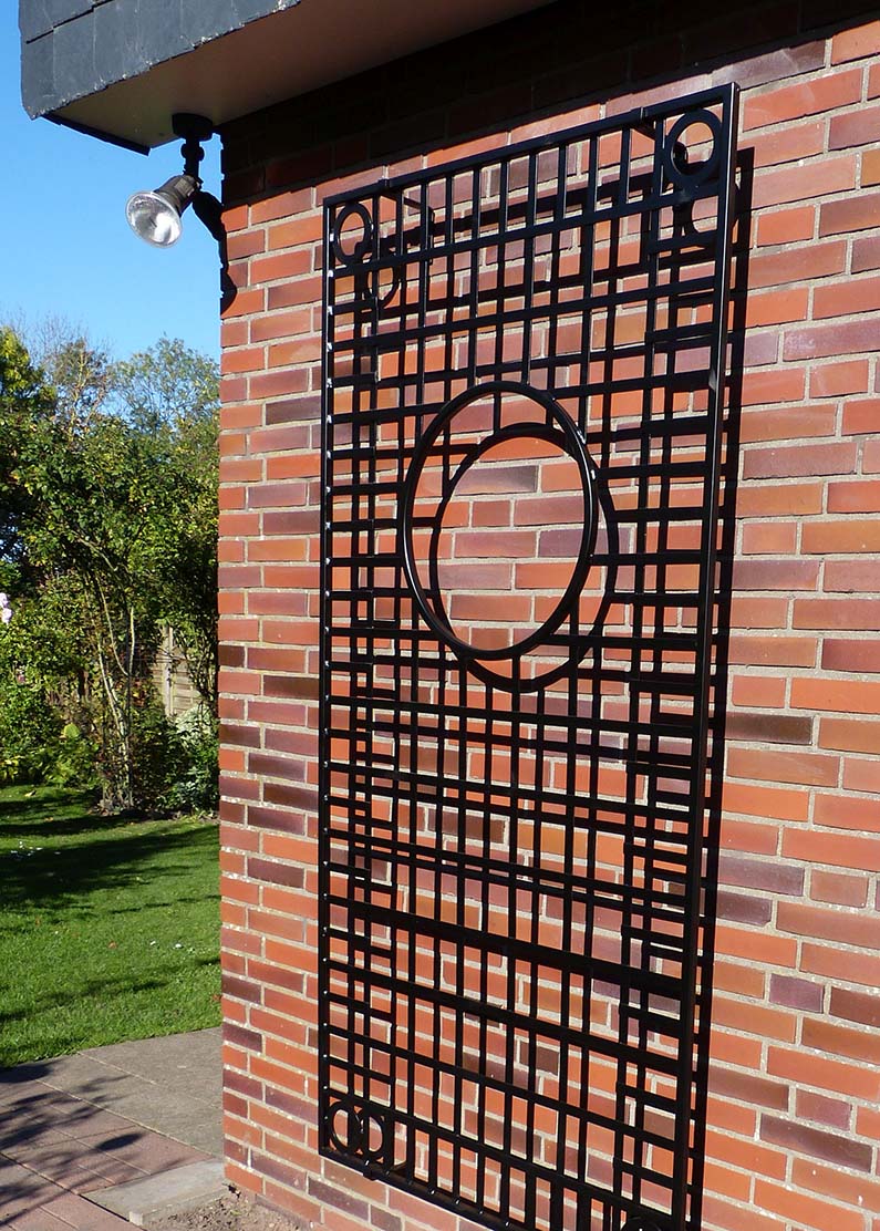 Neogothic wall trellis with unusual design. Perfect for climbing roses