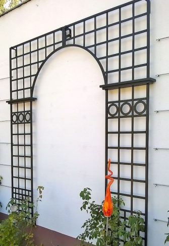 The Osborne House Single Treillage Panel Set installed on a white wall, side angle