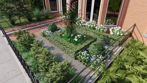 Metal garden obelisk that makes the perfect centrepiece for a front garden