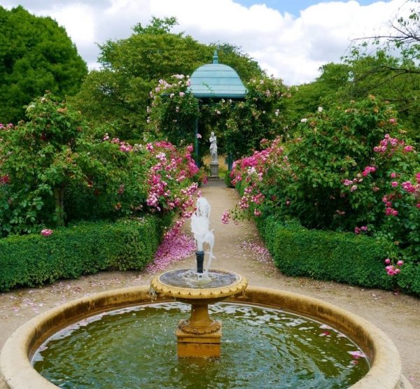 The Wallingford Gazebo with an antique statue creating an attractive focal point near a fountain