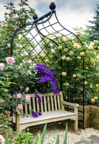 Garden Bench beneath the Victorian-Style Metal Gazebo by Classic Garden Elements