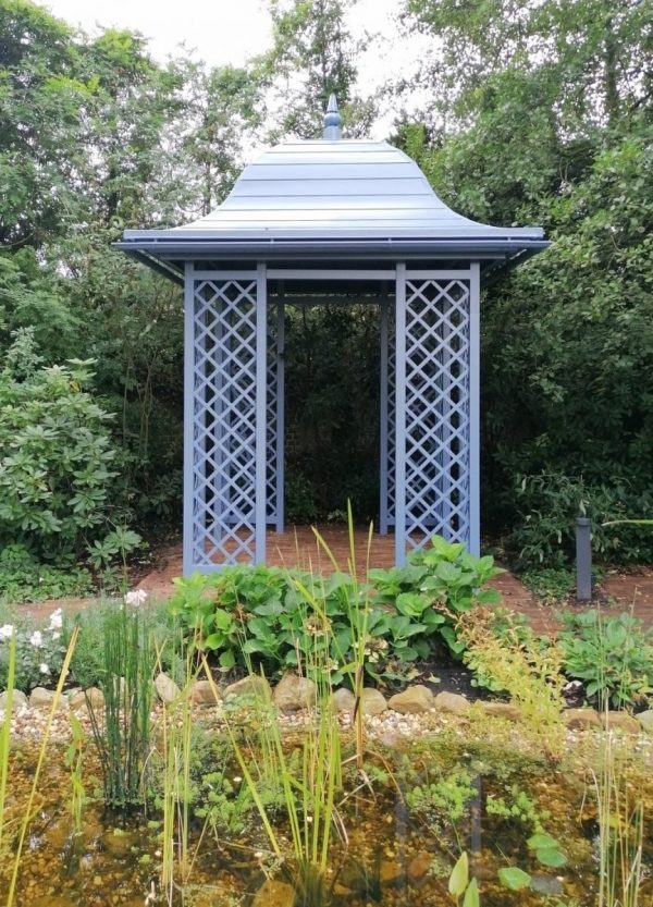Classic Garden Elements' Wallingford Gazebo installed as the focal point near a pond
