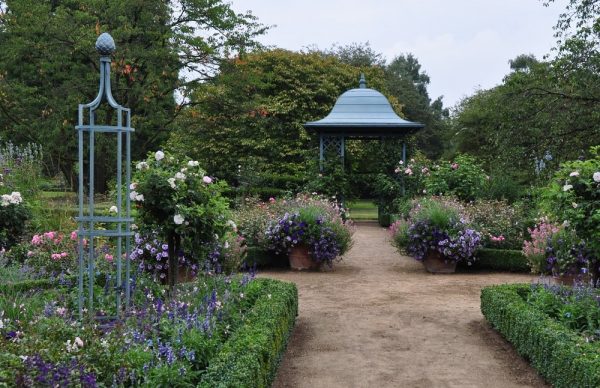 The Wallingford Gazebo and a garden obelisk surrounded by herbaceous borders at the Ellerhoop Arboretum