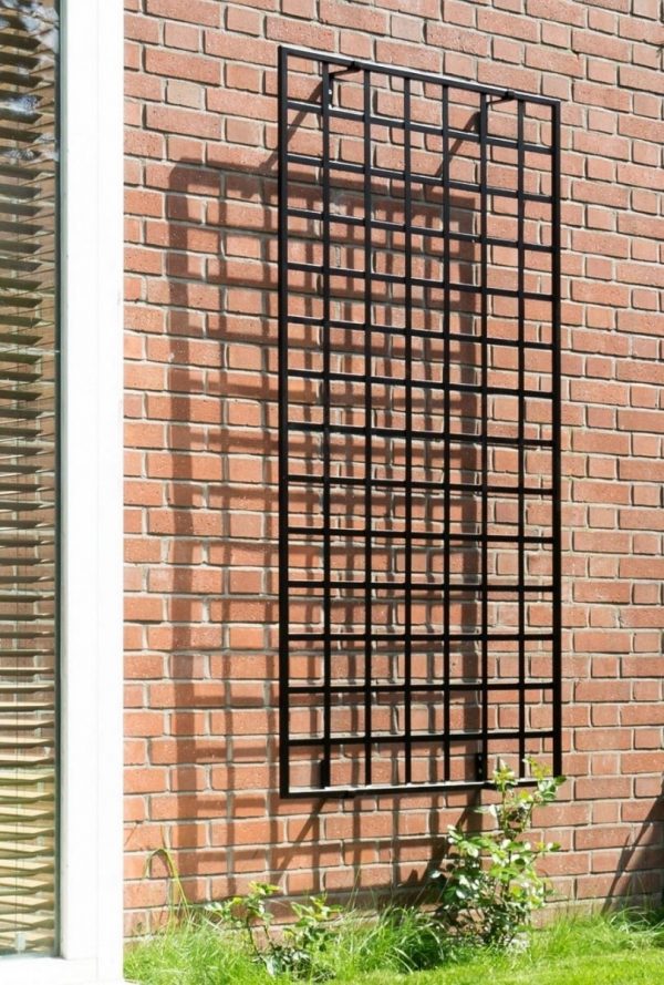 Large Modern Wall Trellis by Classic Garden Elements mounted on a brick wall