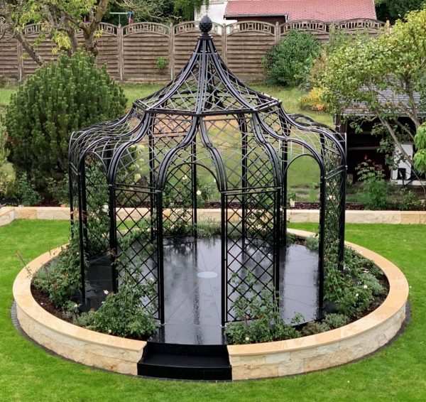 The Schoenbrunn Wrought-Iron Gazebo by Classic Garden Elements with English roses