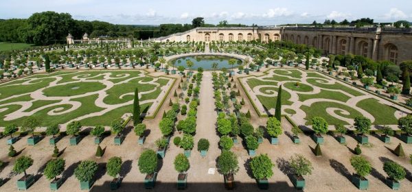 The Orangery parterre at the Palace of Versailles, with original wooden Caisse de Versailles planters for the orange trees